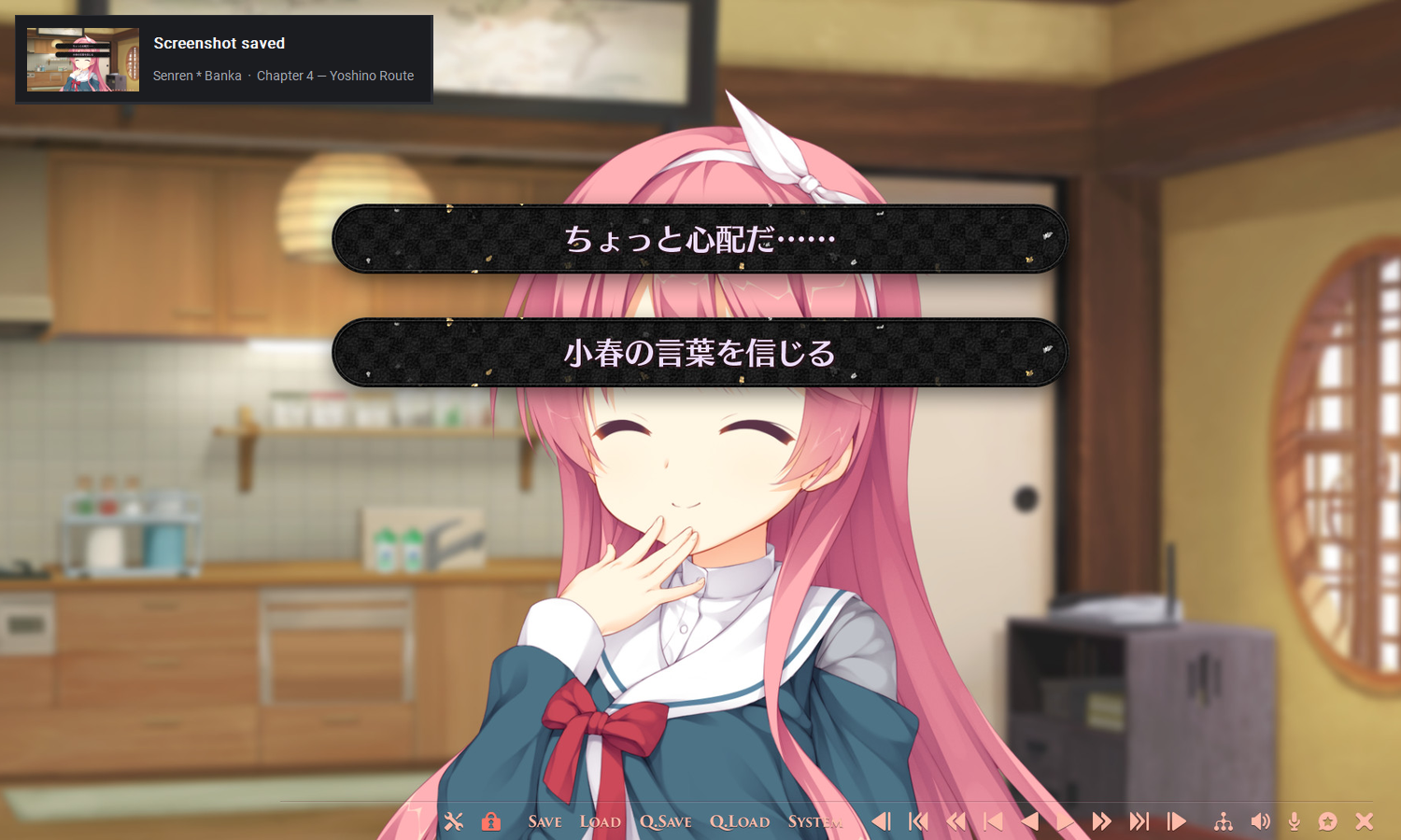 A 'Screenshot saved' notice in the corner of a game